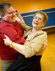 Milan retired executive, Kathleen Wheeler, 79, waltzes again with QC dance instructor Günter Schlueter, after her successful back surgery and total knee replacement.