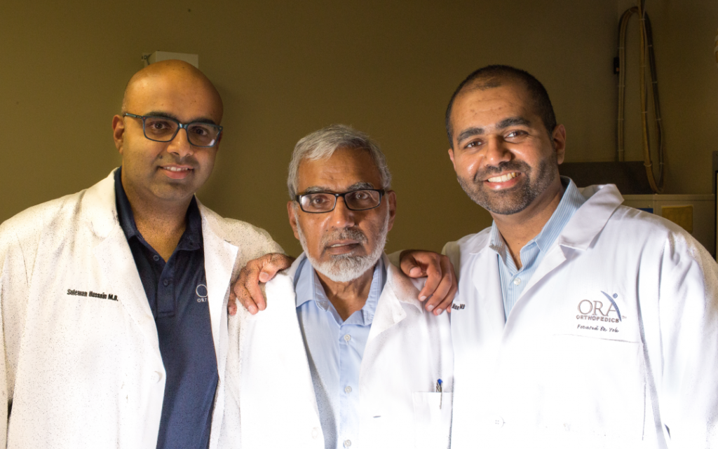 Drs. Suleman (left), Munawar (center) and Was (right) Hussain.